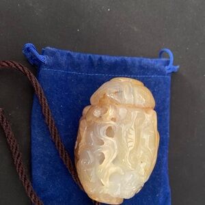Carved Stone Pendant with Cord